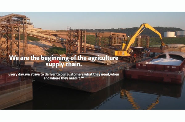 Fertilizer being transported from a barge to a MacroSource warehouse